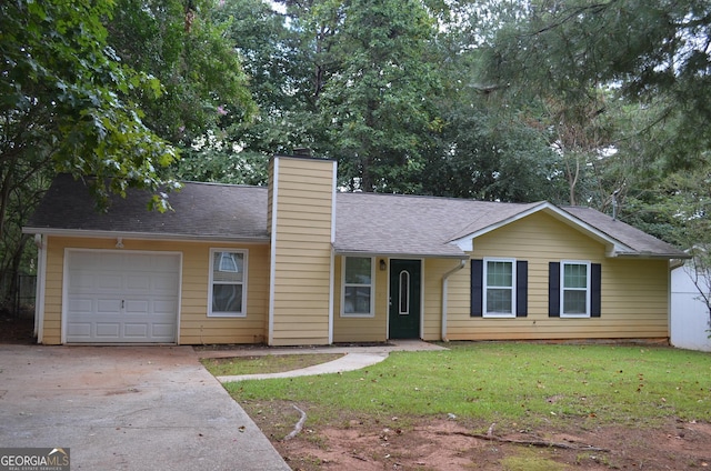 single story home with a front yard and a garage