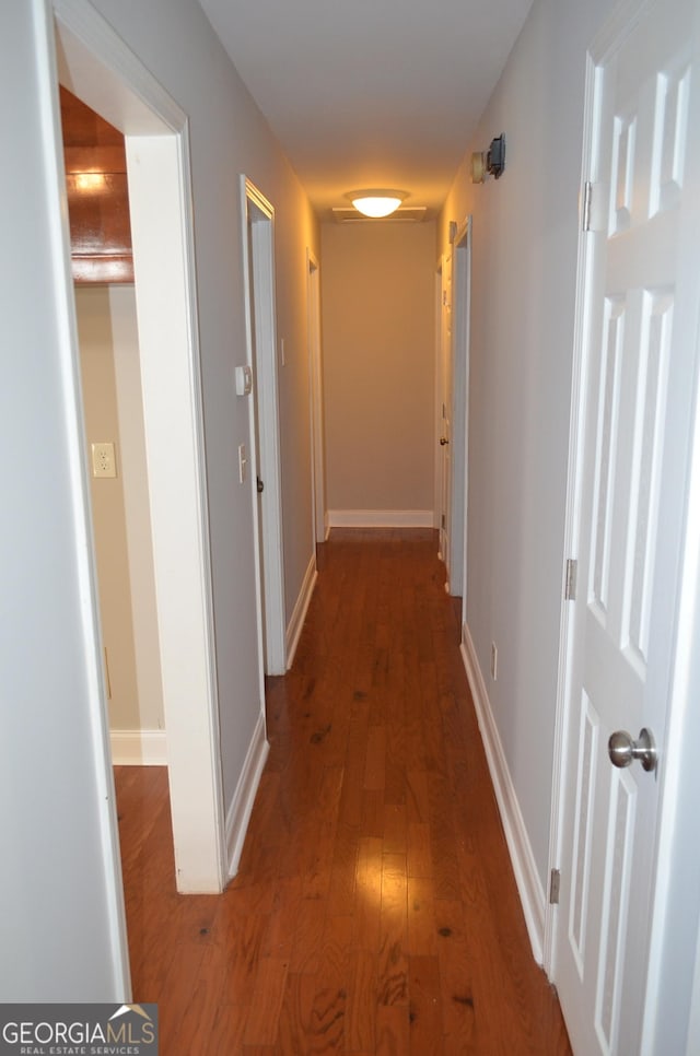 hall featuring dark hardwood / wood-style flooring