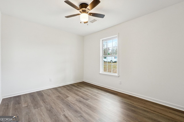 unfurnished room featuring hardwood / wood-style floors and ceiling fan