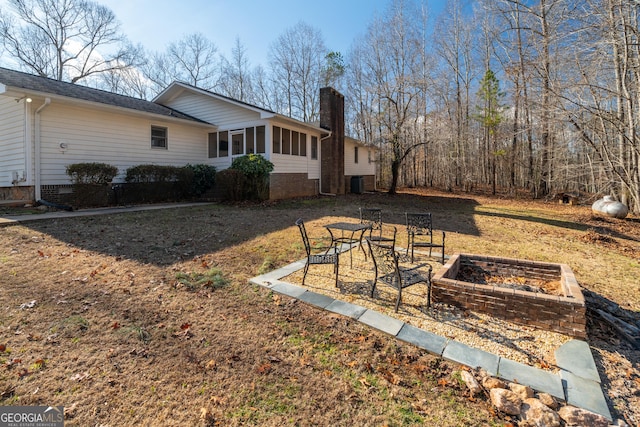 view of yard with a sunroom