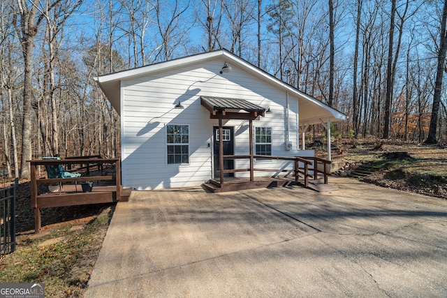 view of front of home with a wooden deck