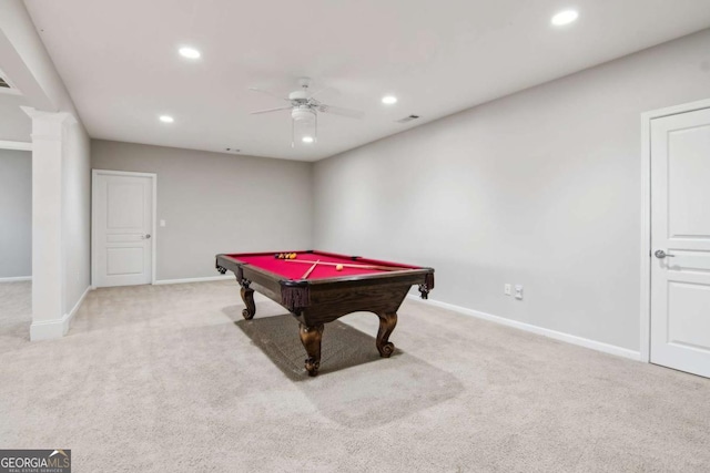 recreation room with light colored carpet, ceiling fan, and billiards