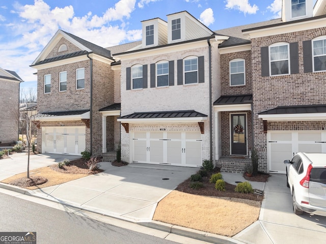 multi unit property featuring a garage