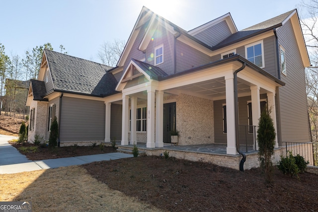 craftsman-style home with covered porch