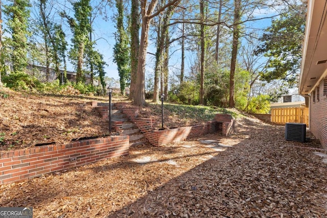 view of yard featuring central AC