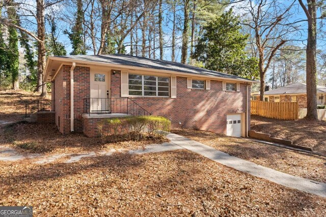 ranch-style home with a garage