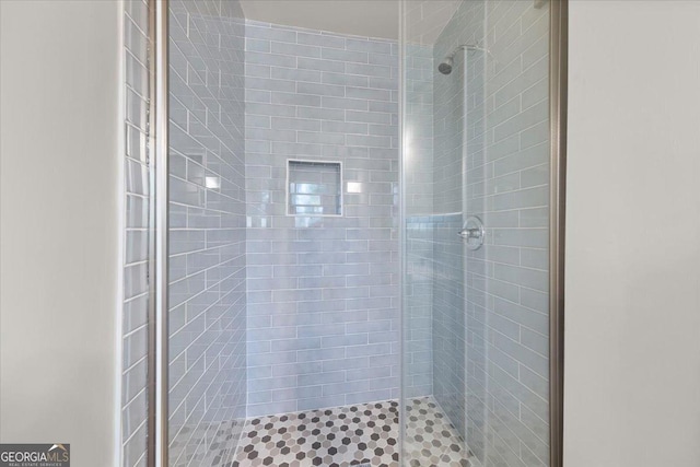 bathroom featuring walk in shower