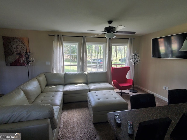 living room with carpet and ceiling fan