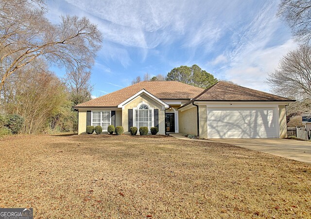 ranch-style house with a garage