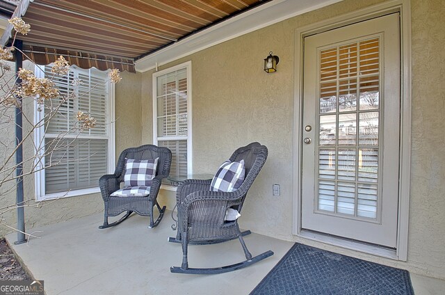 bedroom with access to outside, ceiling fan, and vaulted ceiling