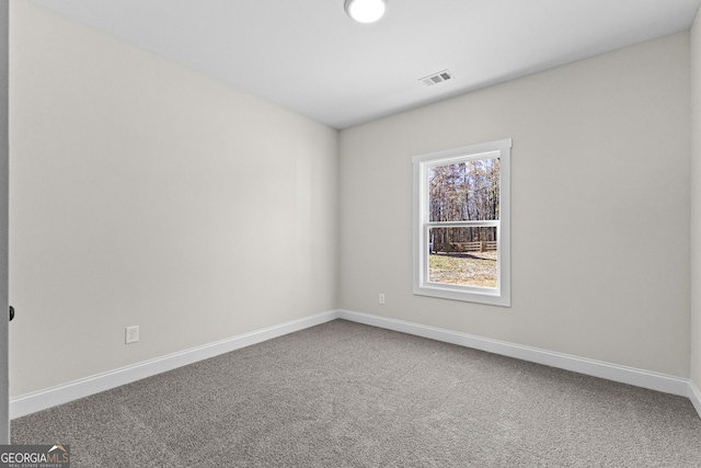 view of carpeted spare room