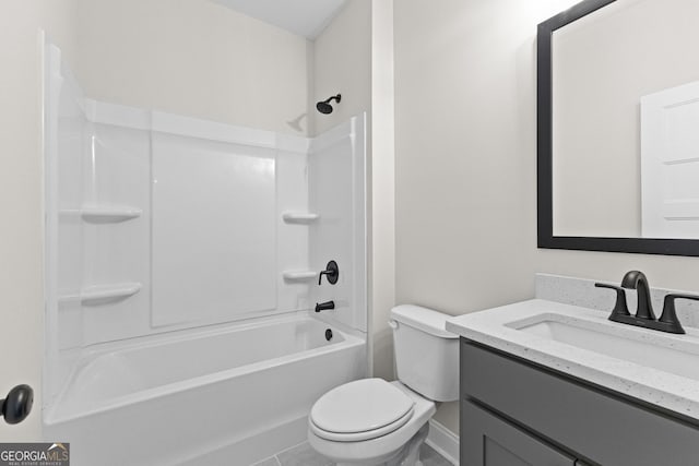 full bathroom with vanity, tub / shower combination, and toilet