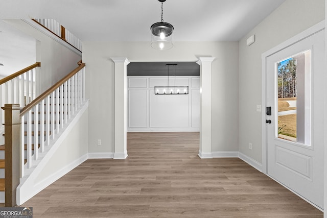 entrance foyer with light wood-type flooring