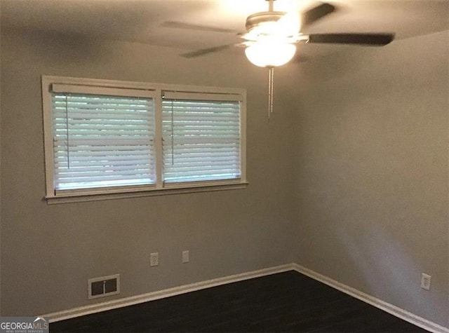 unfurnished room with ceiling fan