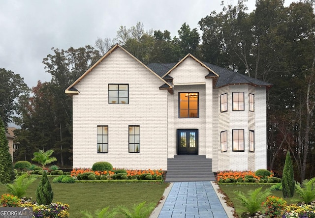 front facade featuring a front lawn