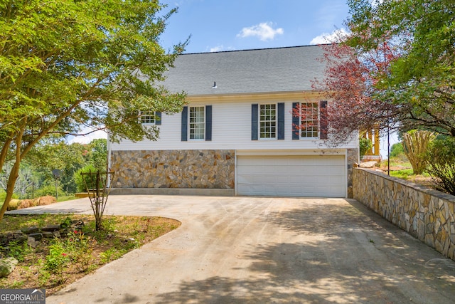 view of front of home with a garage