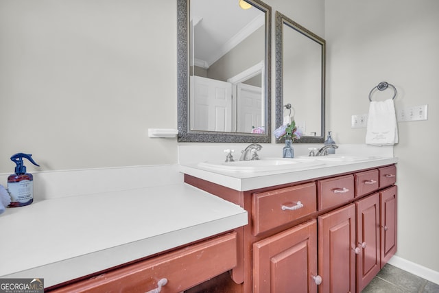 bathroom featuring vanity, tile patterned floors, and ornamental molding