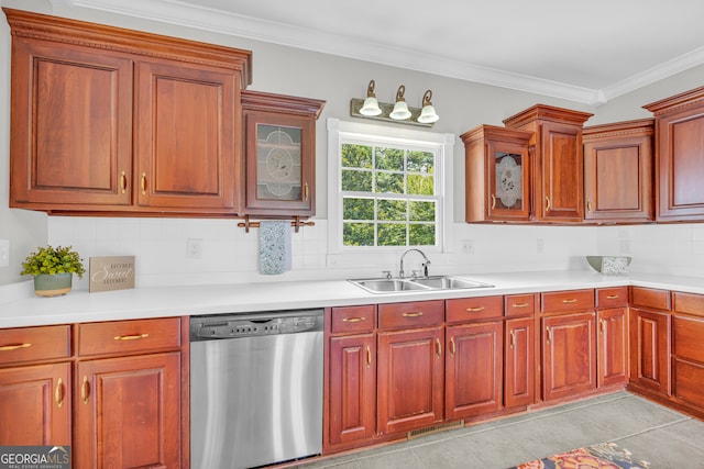 kitchen with tasteful backsplash, stainless steel dishwasher, crown molding, and sink