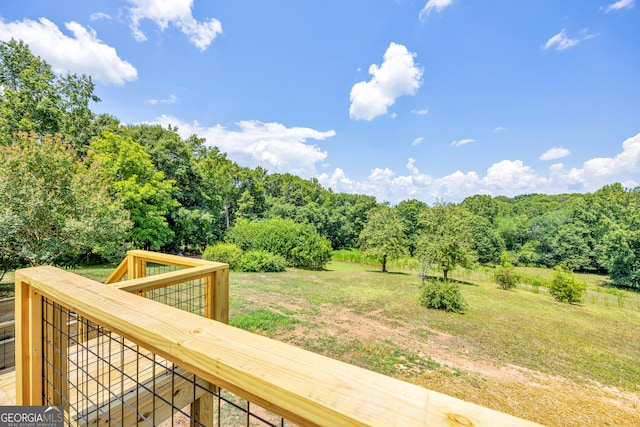 deck featuring a yard