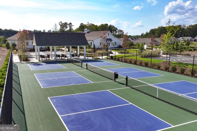 view of sport court with a gazebo and basketball court