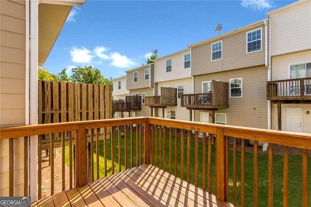 deck featuring a yard