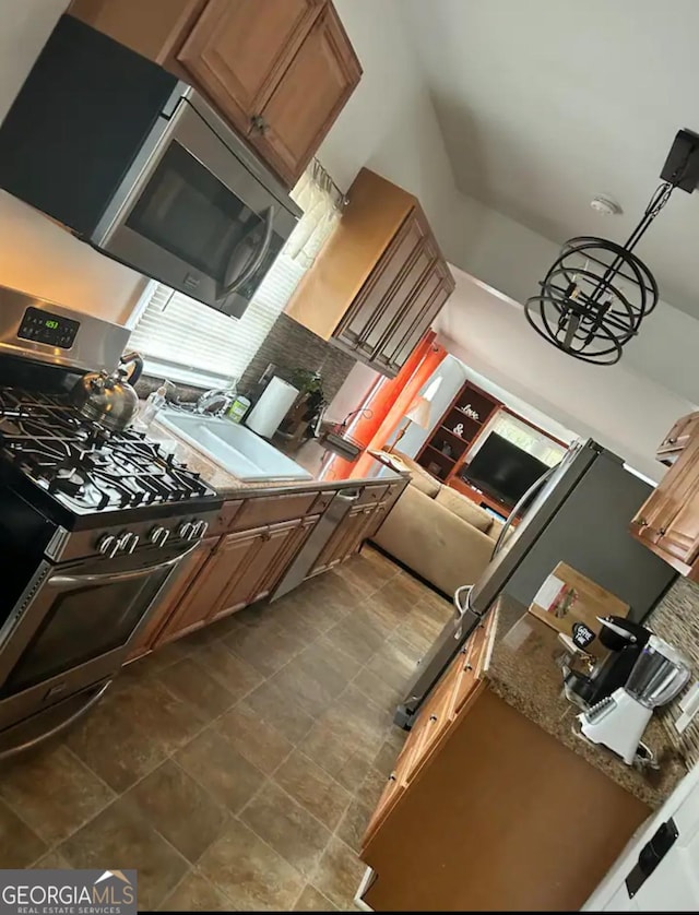 kitchen with sink and stainless steel appliances