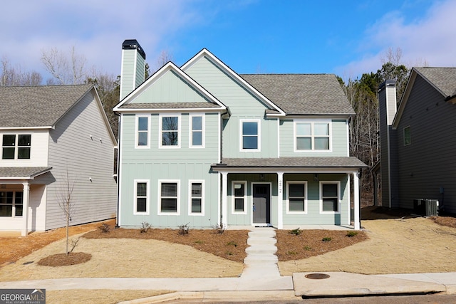 view of front of house featuring central AC and covered porch