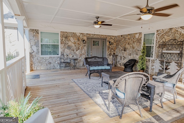 wooden terrace with ceiling fan