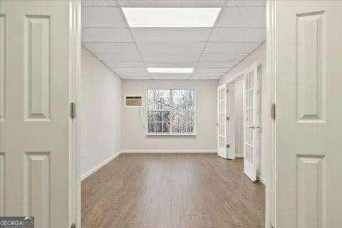 empty room with a paneled ceiling