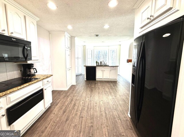 staircase featuring hardwood / wood-style flooring