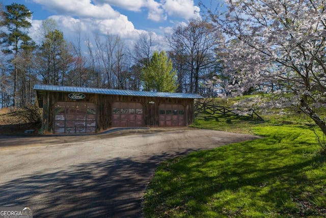 view of outbuilding featuring a garage