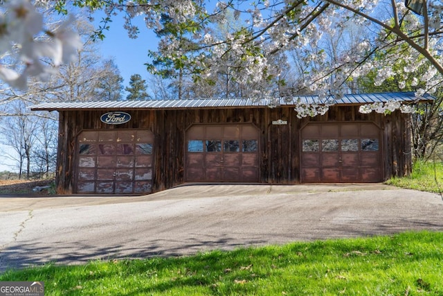 view of outdoor structure featuring a garage