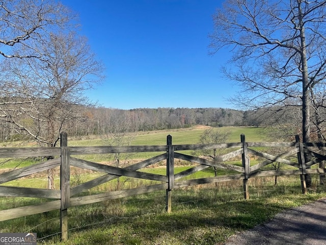 view of gate featuring a rural view