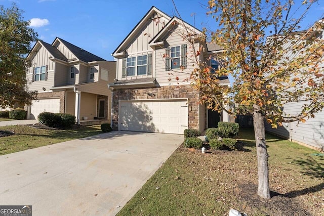 view of front facade with a front yard and a garage