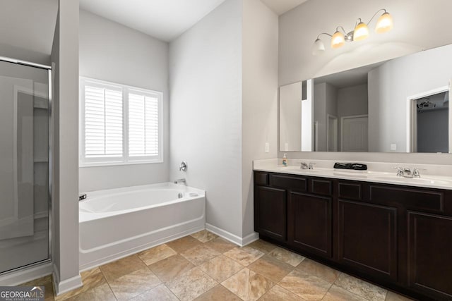 bathroom with shower with separate bathtub and vanity