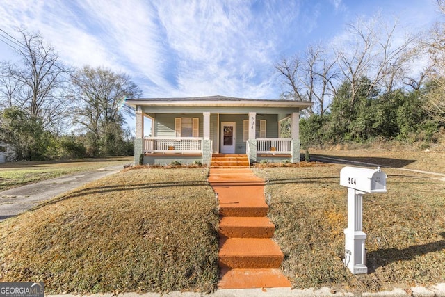 bungalow-style house featuring covered porch