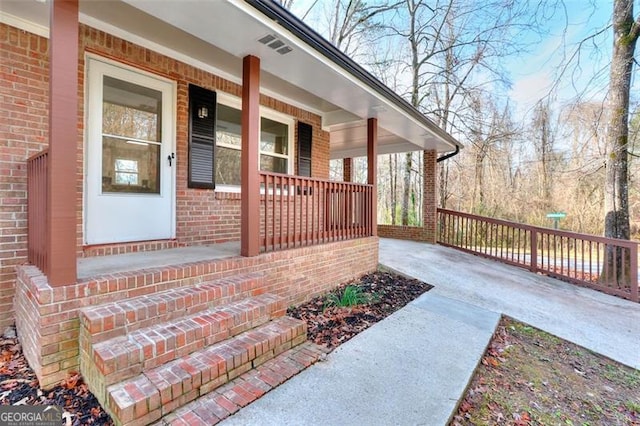 view of home's exterior with a porch