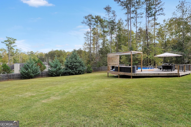 view of yard featuring a wooden deck