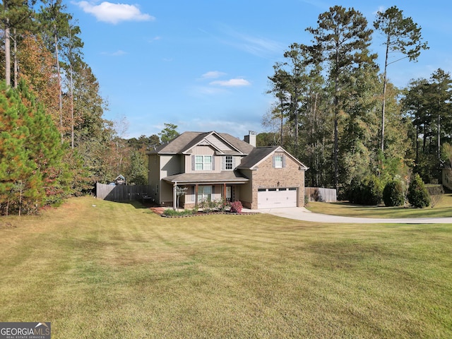 view of front facade with covered porch and a front yard