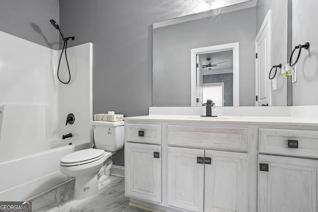 full bathroom with vanity, shower / bath combination, toilet, and ceiling fan