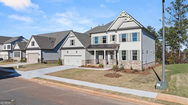 view of front of home with a garage and a front lawn