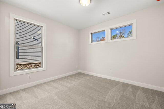 view of carpeted spare room