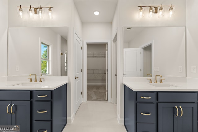 bathroom featuring vanity and tile patterned flooring