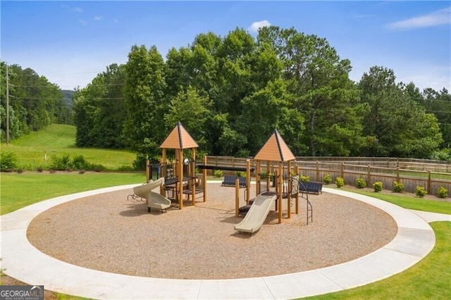 view of jungle gym featuring a yard