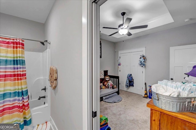 carpeted bedroom with ceiling fan