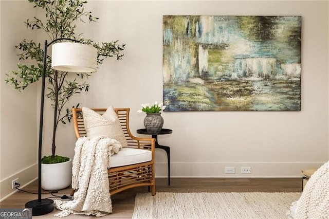 sitting room featuring hardwood / wood-style flooring