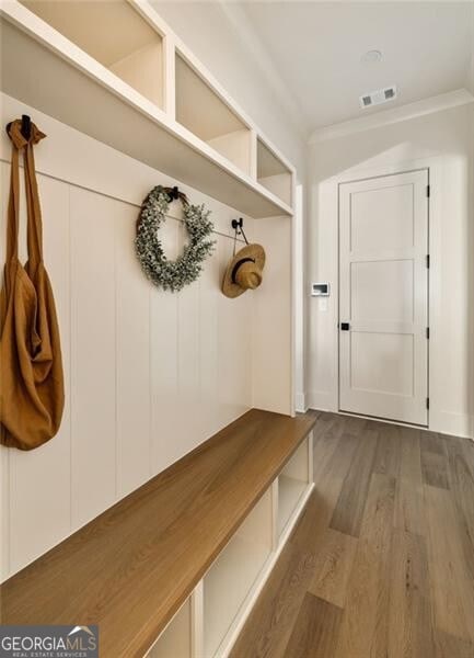 mudroom with dark hardwood / wood-style flooring