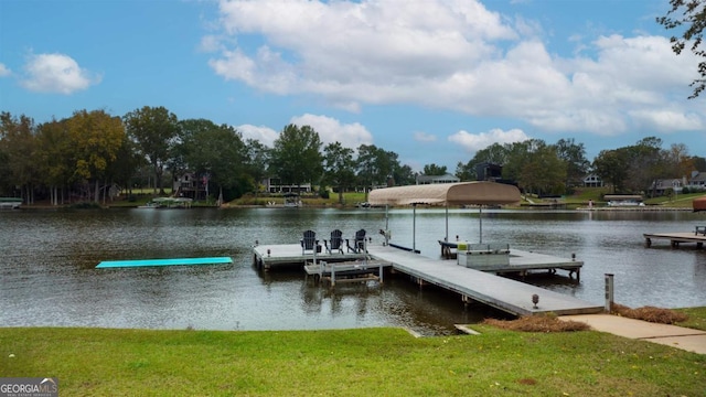 view of dock featuring a water view and a lawn