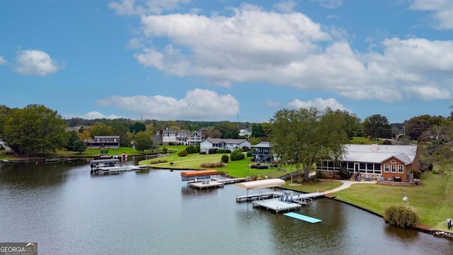 water view featuring a boat dock, boat lift, and a residential view