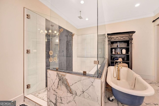 bathroom with ornamental molding and shower with separate bathtub